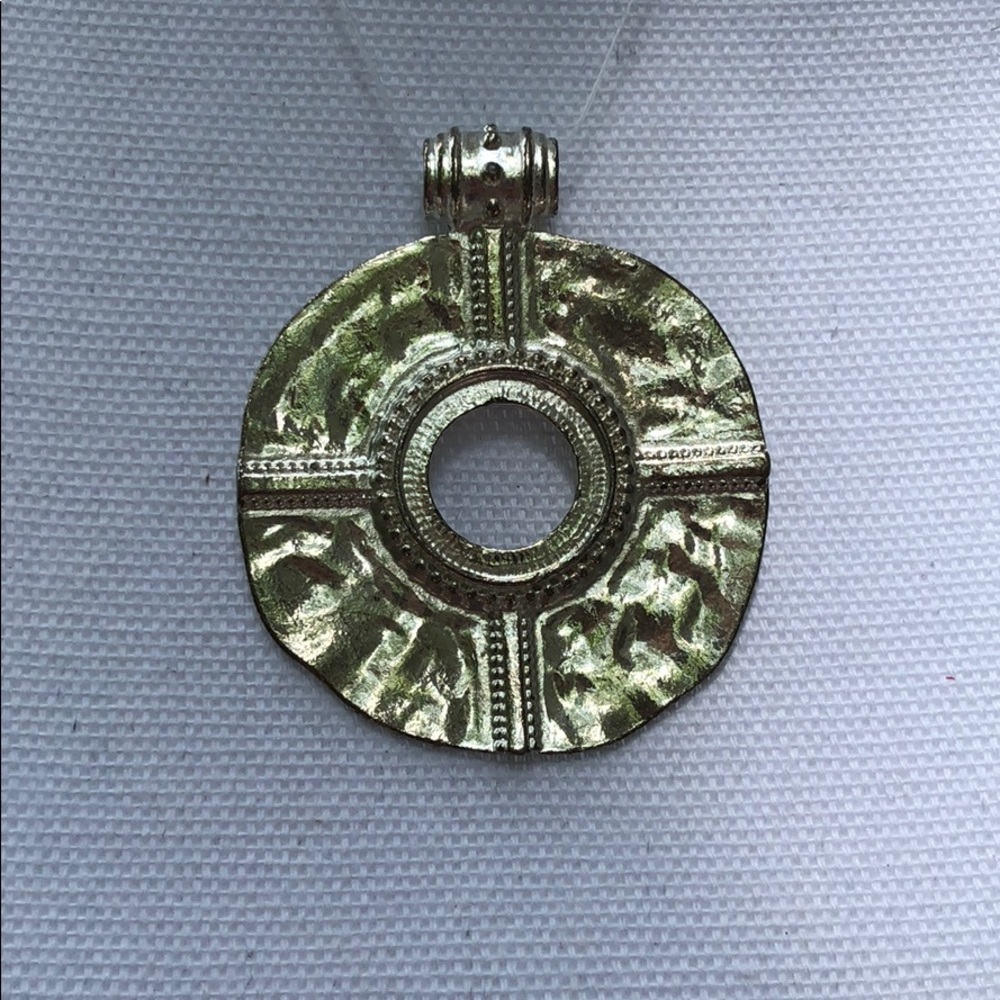Silver tone pendant